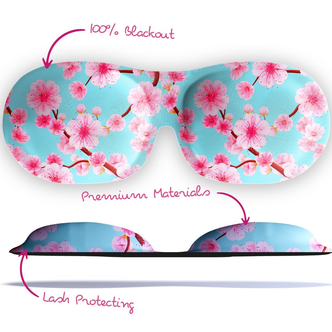 Contoured 3D blackout sleep mask by SMUG with cherry blossom tree print, featuring a comfortable fit and stylish design.