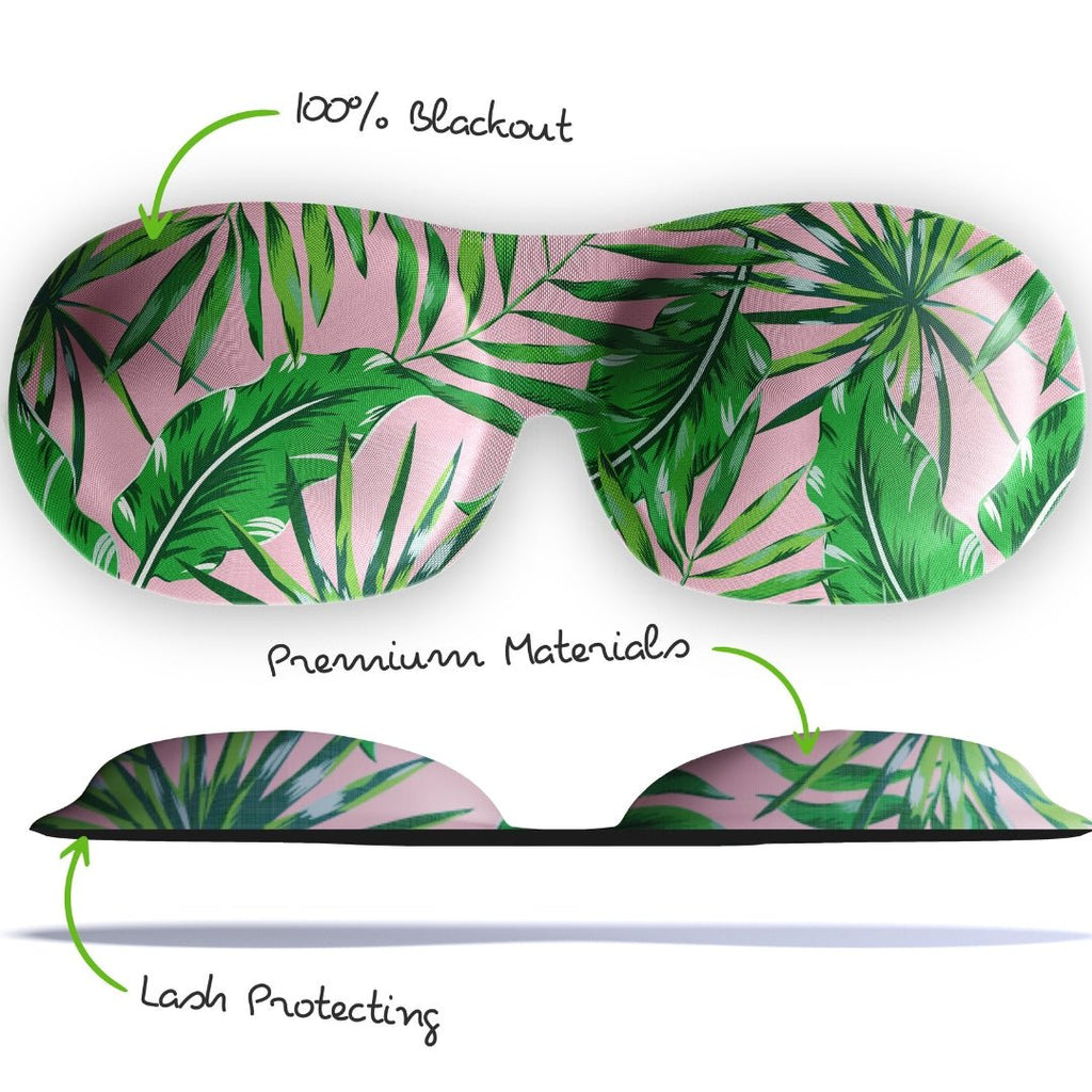 Contoured 3D blackout sleep mask by SMUG featuring green and pink palm tree leaf print for comfortable sleep.
