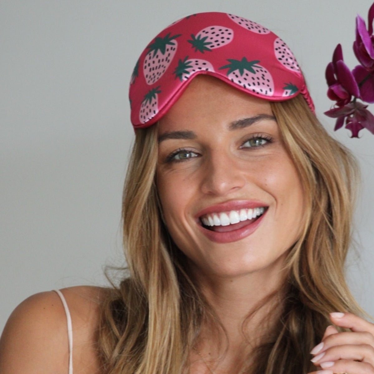 SMUG Cloud Sleep Mask with strawberry dreams satin print, padded for comfort and gentle eye coverage for restful sleep.