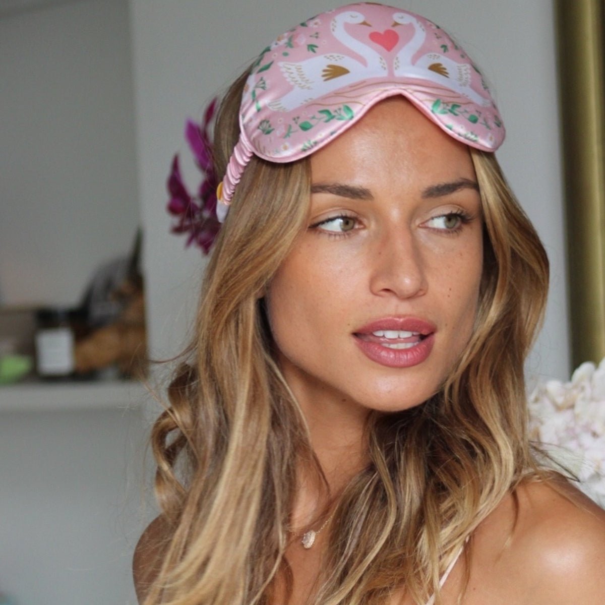 SMUG cloud padded satin sleep mask with elegant swans print, designed for comfortable, restful sleep.