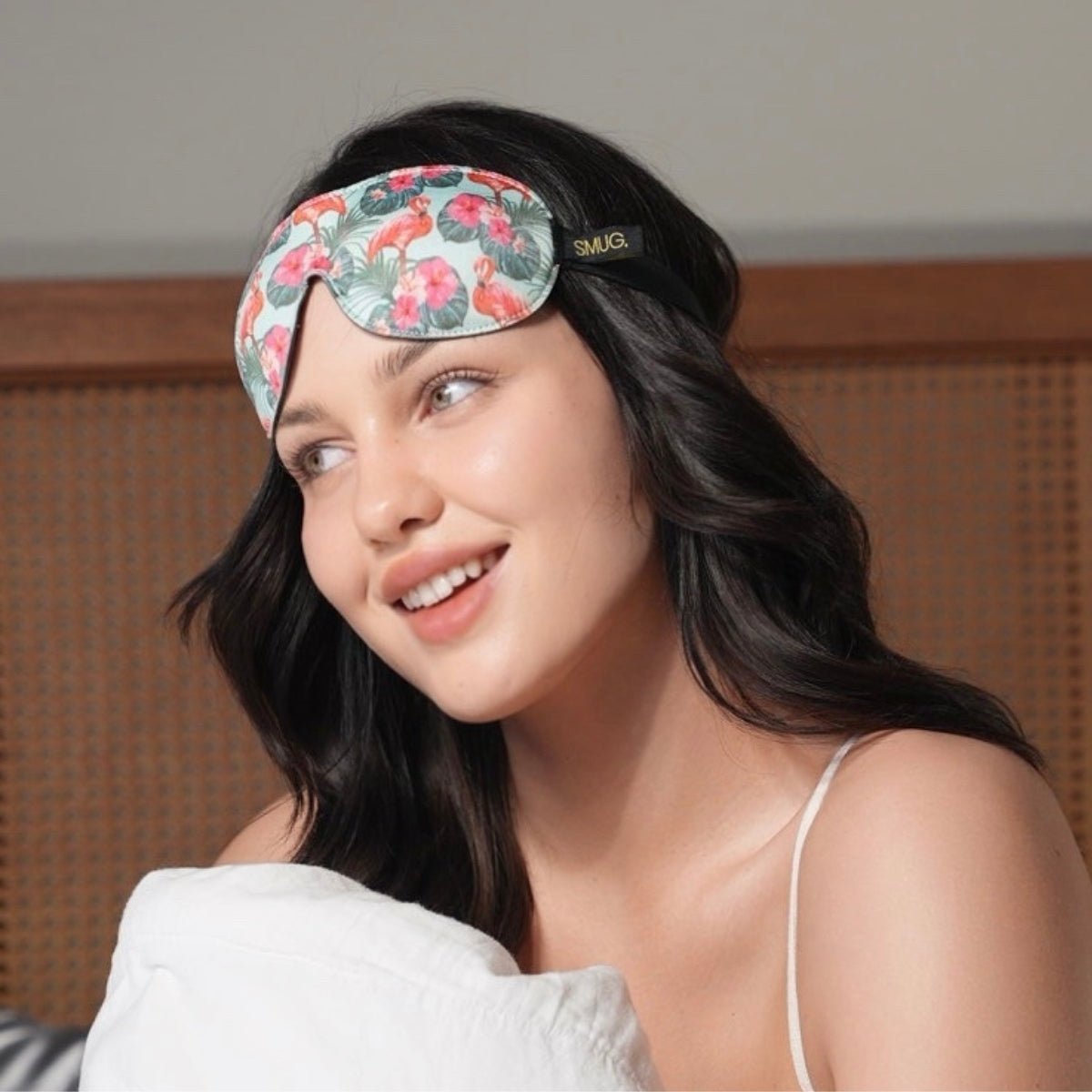 Contoured SMUG blackout sleep mask with flamingo print and palm design, designed for comfortable sleep and light blocking.
