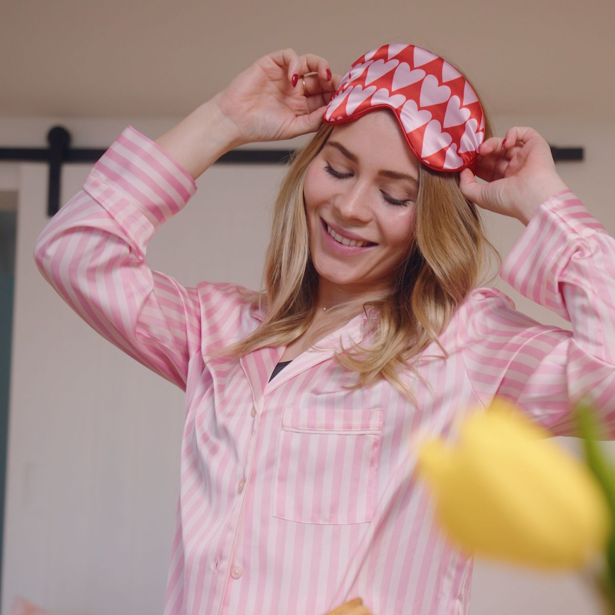 SMUG satin sleep mask with longheart print, soft fabric, and comfortable design for restful sleep.