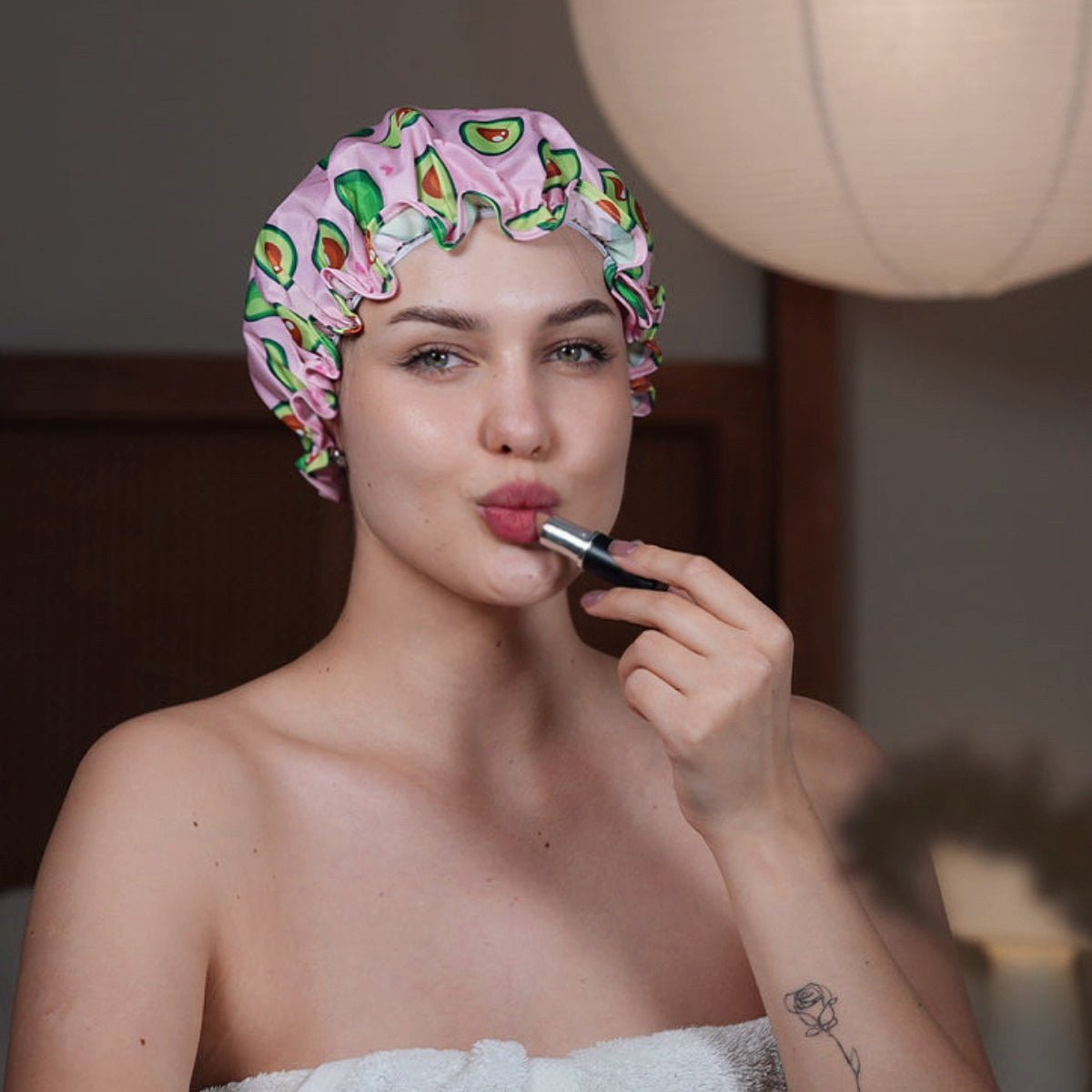 SMUG avocado print shower cap with waterproof material, suitable for protecting hair while bathing or showering.