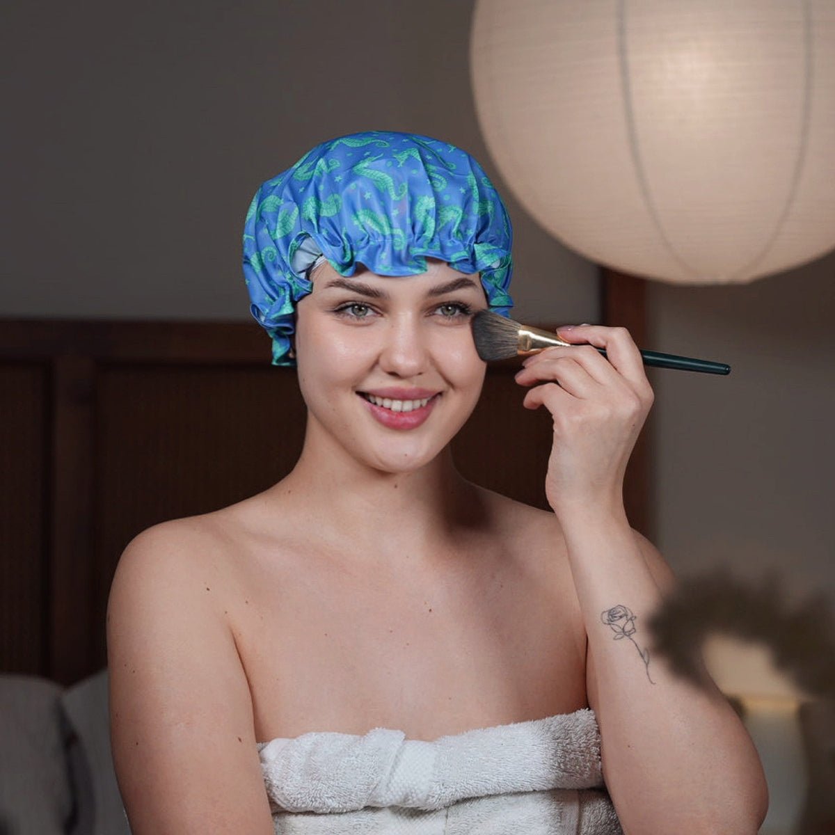 SMUG Seahorse Print Shower Cap with waterproof material, featuring a colorful seahorse design, perfect for hair protection during showers.
