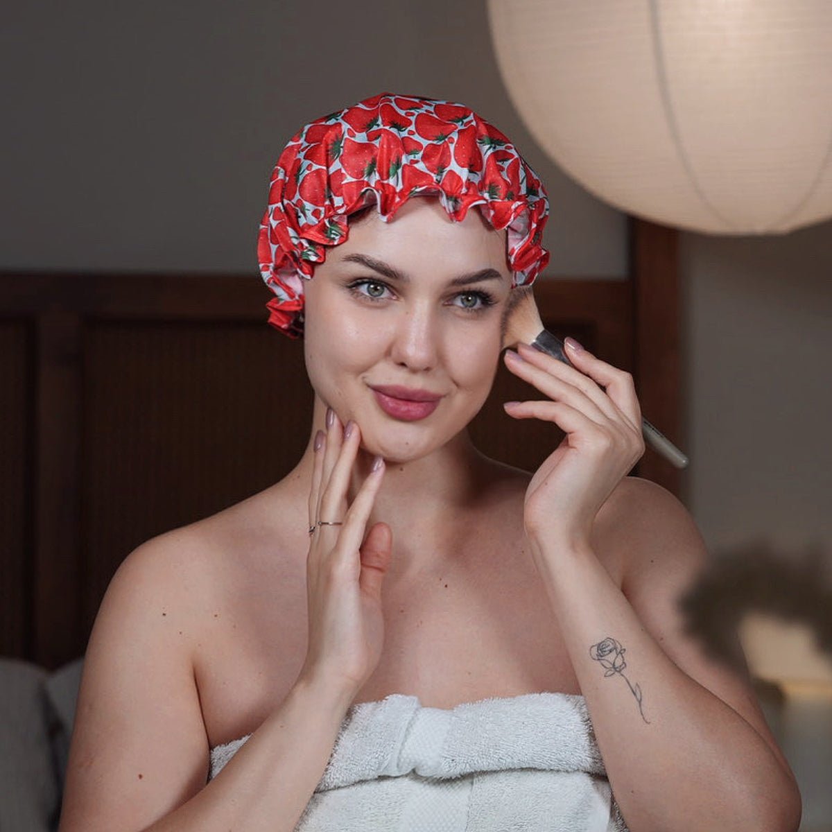 SMUG strawberry print shower cap with waterproof material, featuring a playful strawberry design, suitable for hair protection during showers.