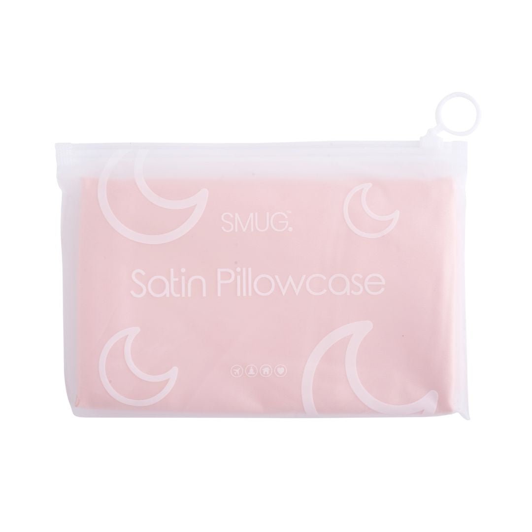 SMUG pink satin pillowcases and sleep masks set with packaging, soft and luxurious for restful sleep and skin care.