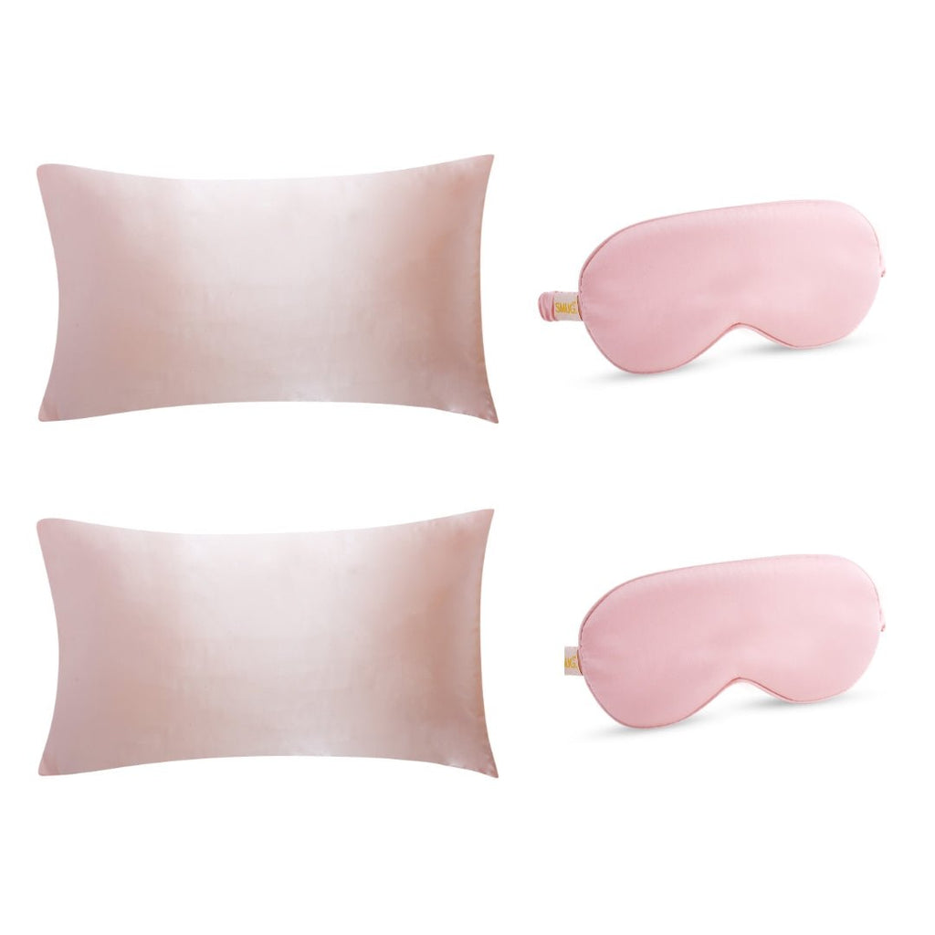 Pink satin pillowcases and sleep mask set by SMUG, featuring luxurious, smooth fabric for comfortable sleep and elegant style.
