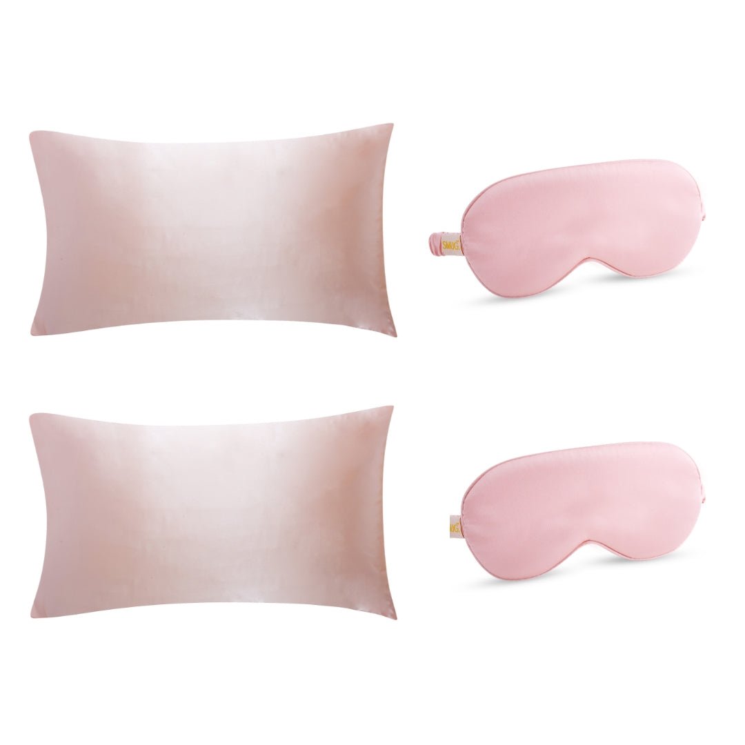 Pink satin pillowcases and sleep mask set by SMUG, featuring luxurious, smooth fabric for comfortable sleep and elegant style.