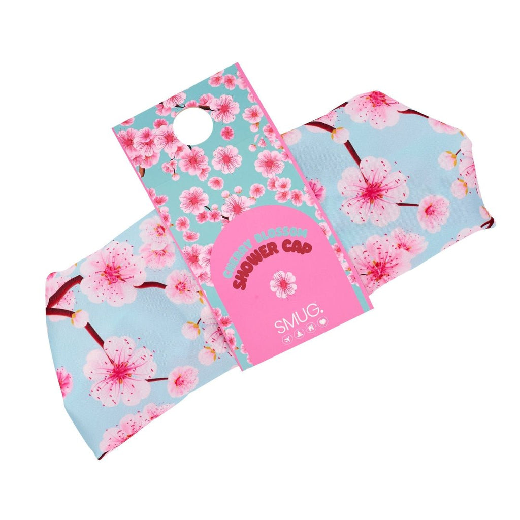 SMUG cherry blossom print shower cap with waterproof material, designed to protect hair during shower or bath.