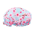 SMUG shower cap with cherry blossom print, waterproof bath accessory designed to keep hair dry during showers.