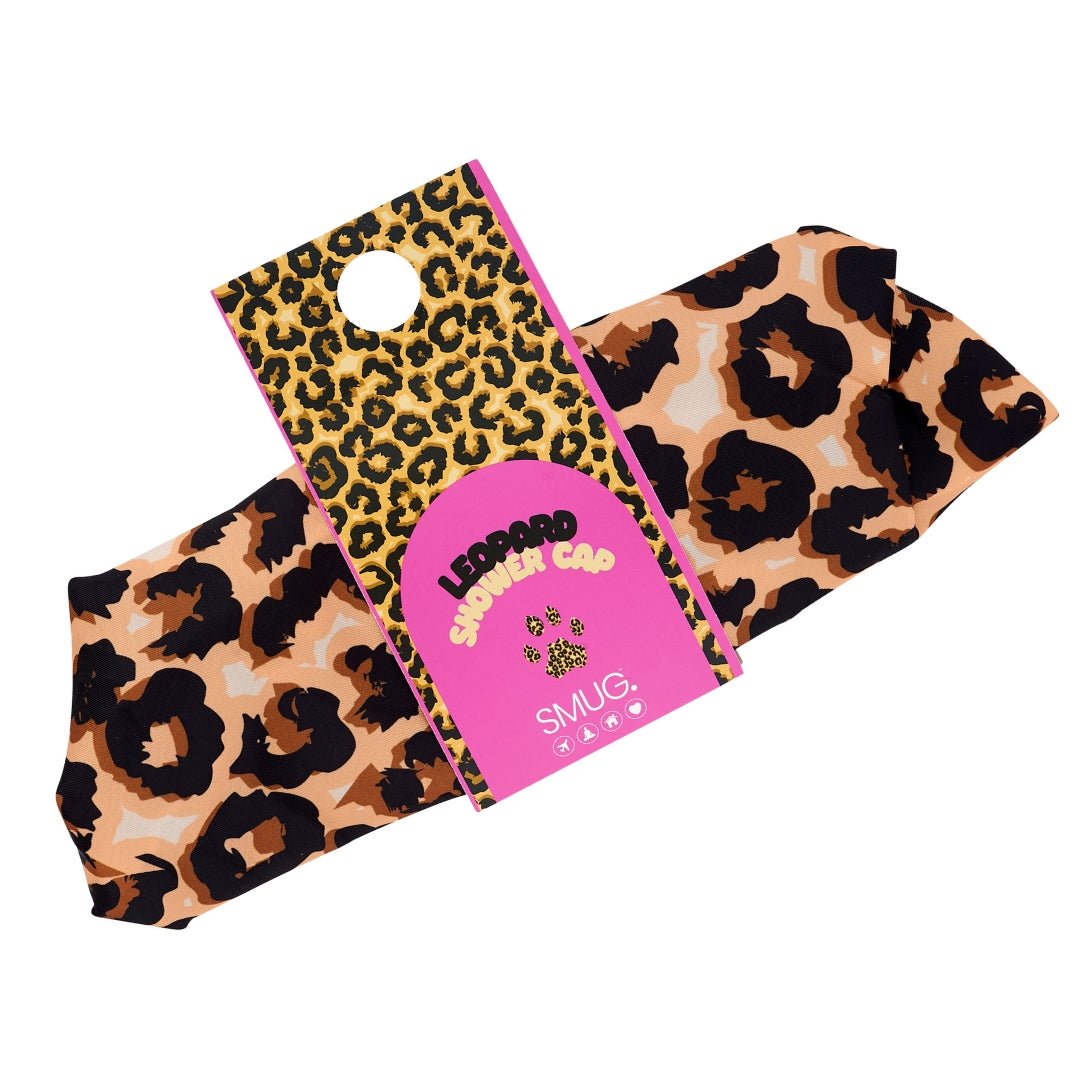 SMUG leopard print shower cap in packaging, waterproof and reusable hair protection for shower or bath.