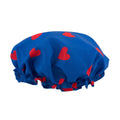 SMUG loveheart print shower cap with waterproof material, designed to keep hair dry during baths or showers.