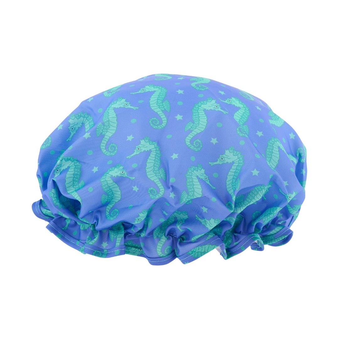 SMUG shower cap with colorful seahorse print, waterproof design, ideal for protecting hair during showers.