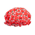 SMUG strawberry print shower cap made of waterproof material, featuring a colorful strawberry pattern for hair protection during showers.