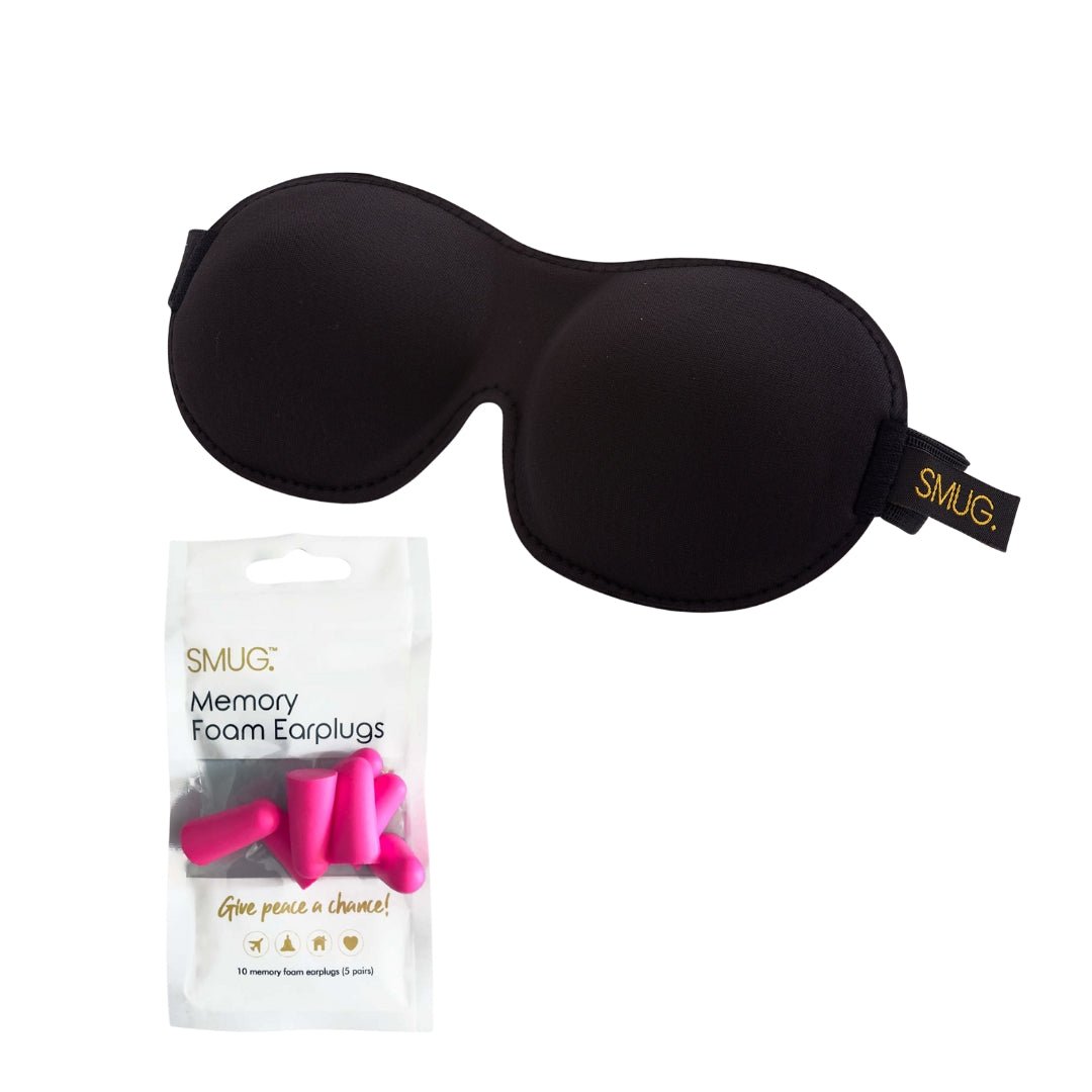 Contoured 3D black blackout sleep mask by SMUG with earplugs, designed for comfortable, complete sleep blocking.