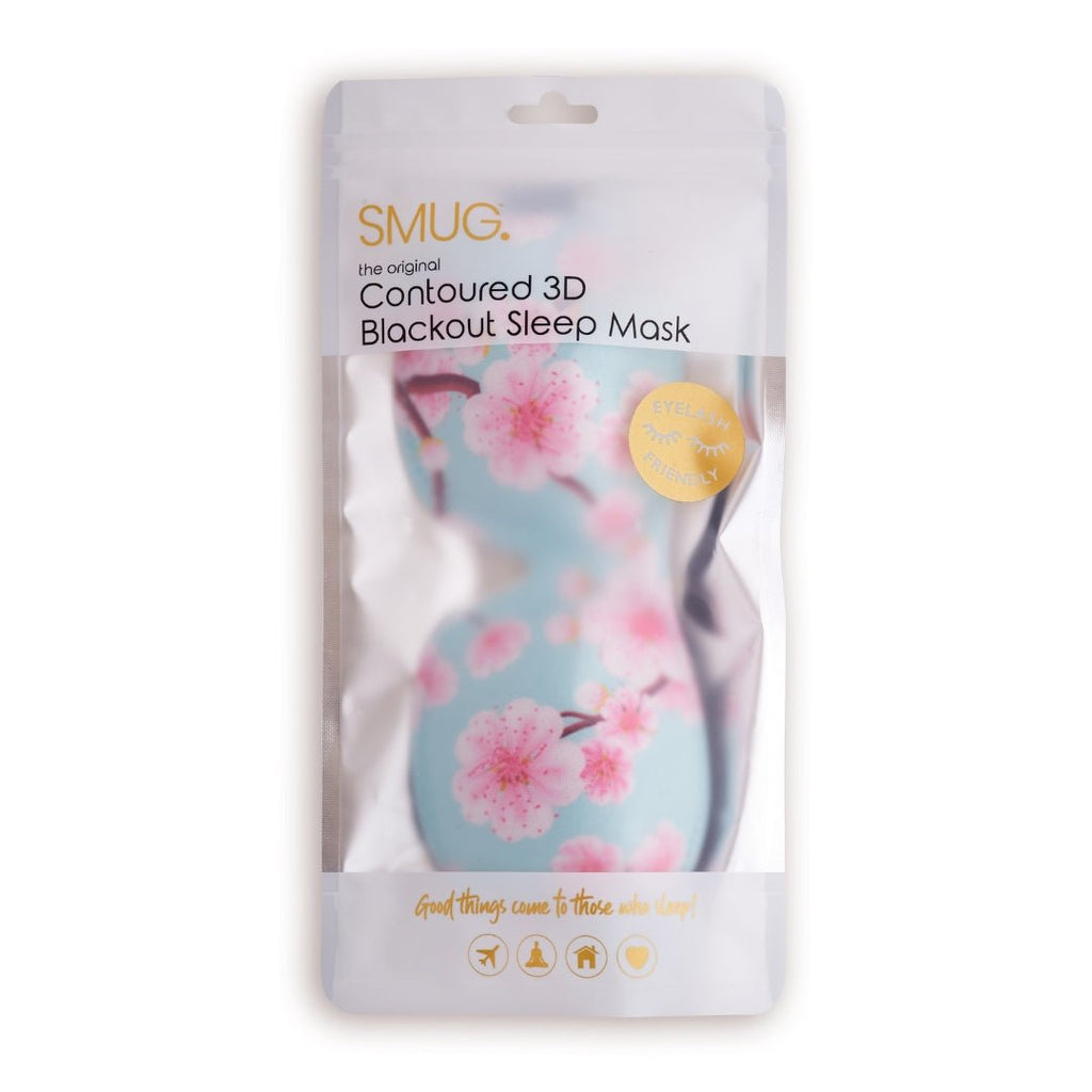Contoured 3D black sleep mask with cherry blossom print by SMUG, designed for comfortable, full coverage sleep.