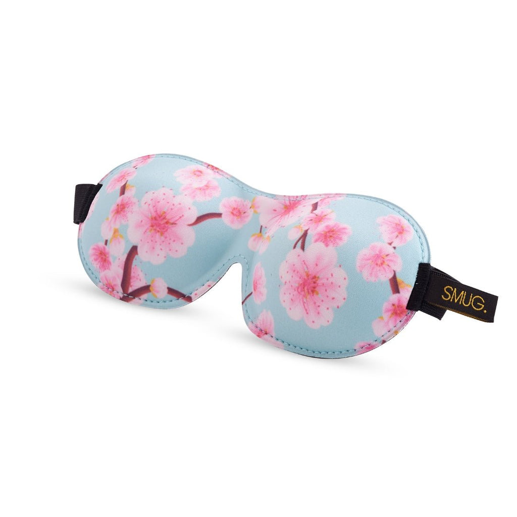 Contoured 3D Blackout Sleep Mask with cherry blossom print by SMUG, designed to block light and ensure comfortable sleep.