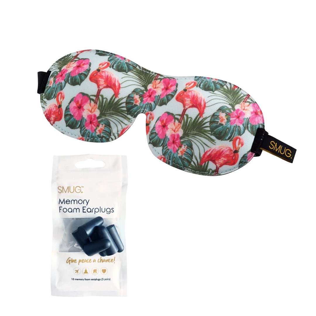 Contoured SMUG sleep mask with flamingo print and earplugs, designed for blackout and comfortable sleep.