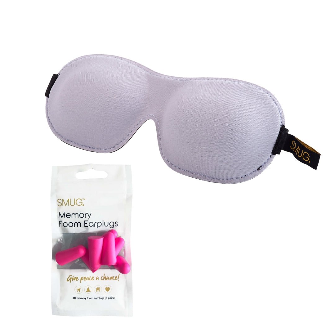 Contoured 3D black blackout sleep mask by SMUG in grey with earplug, designed for comfortable sleep and light blocking.
