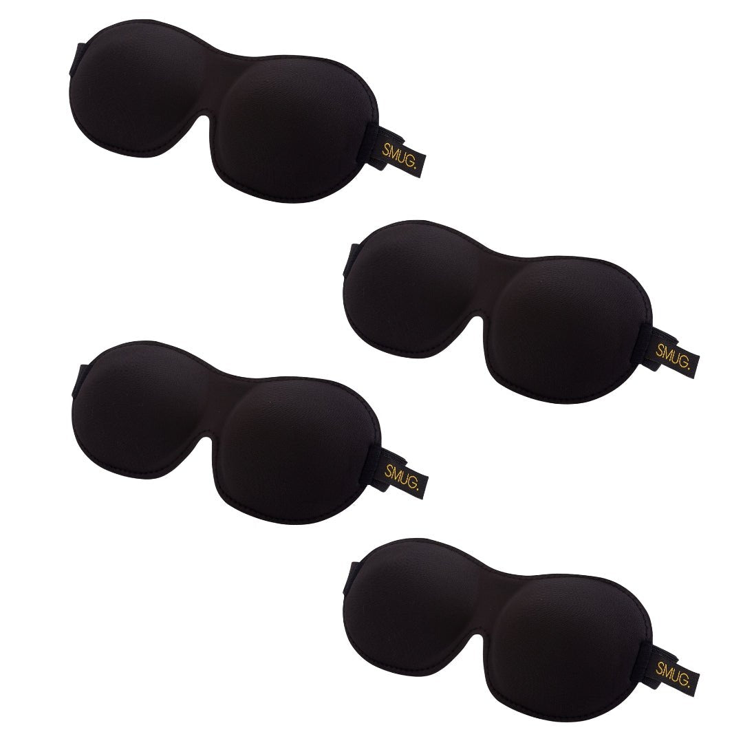 Contoured SMUG sleep mask set with multiple designs, including black masks, for comfortable, light-blocking sleep.