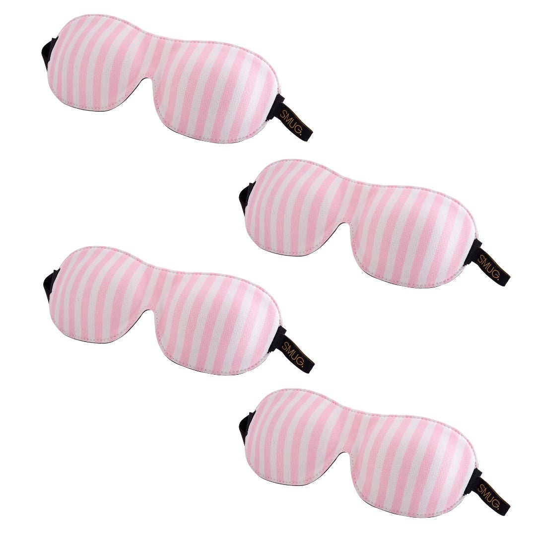 Set of SMUG contoured sleep masks in multiple colorful designs, featuring soft fabric and adjustable straps for comfortable sleep.