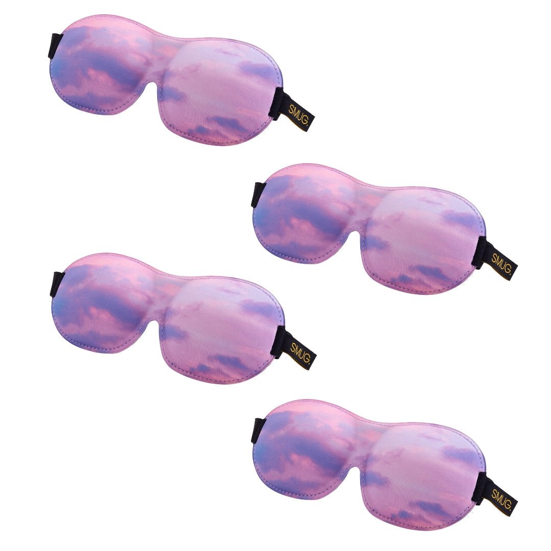 Set of SMUG contoured sleep masks in various designs, including a cloudy sky pattern, perfect for comfortable sleep.