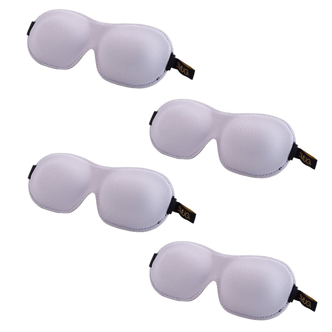 Contoured SMUG sleep mask set in various designs, including a grey sleep mask, for comfortable, block-out sleep and relaxation.