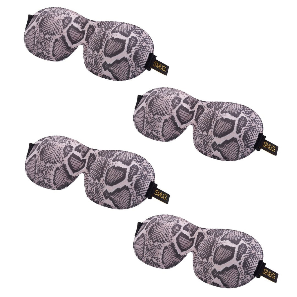 Contoured SMUG sleep mask set with various designs, including a snake pattern, for comfortable, eye-covering sleep aid.