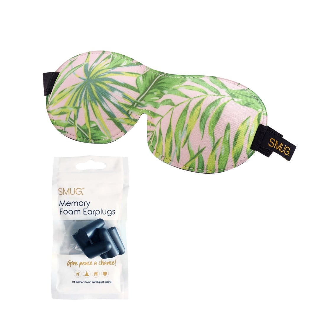 Contoured 3D black sleep mask with palm print and earplugs from SMUG, designed for comfortable, light-blocking sleep.