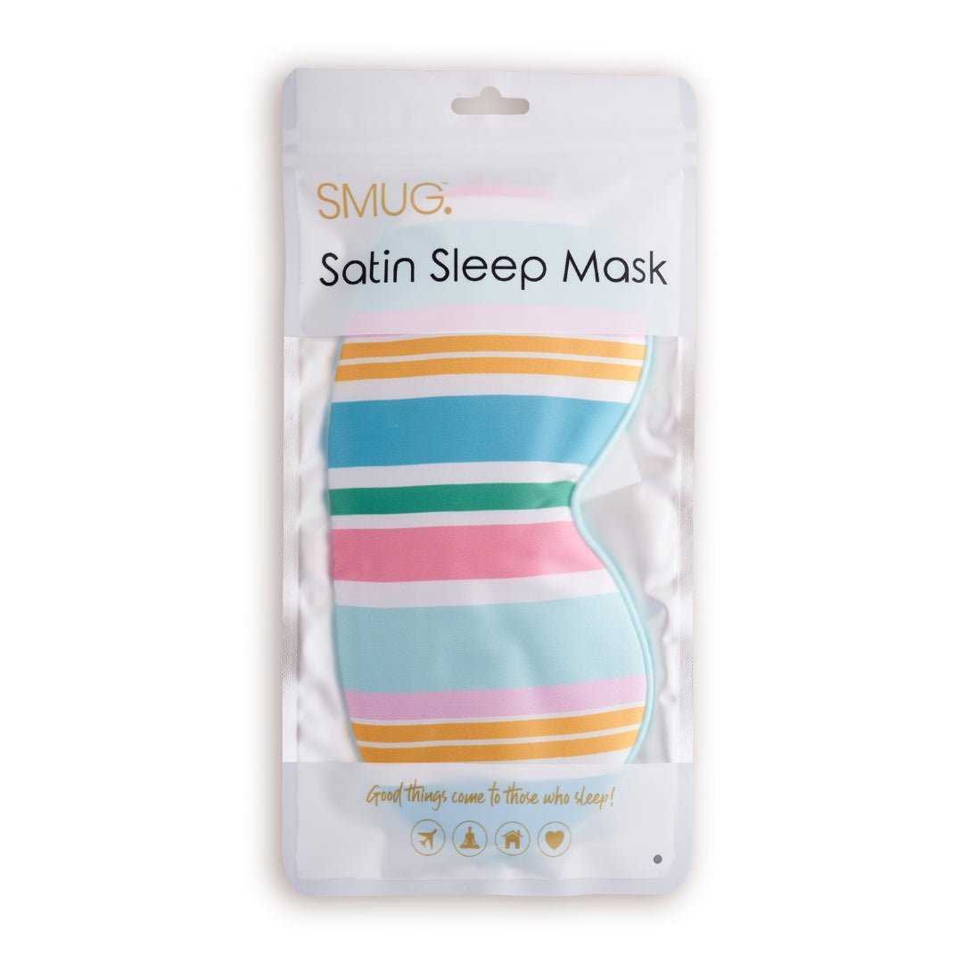SMUG satin sleep mask with bold spring stripe print, featuring a soft satin fabric and adjustable strap for comfortable rest.