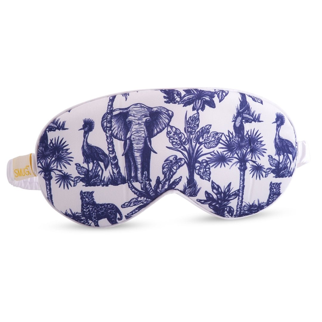 SMUG satin sleep mask with playful elephant print, soft fabric for comfortable overnight rest.