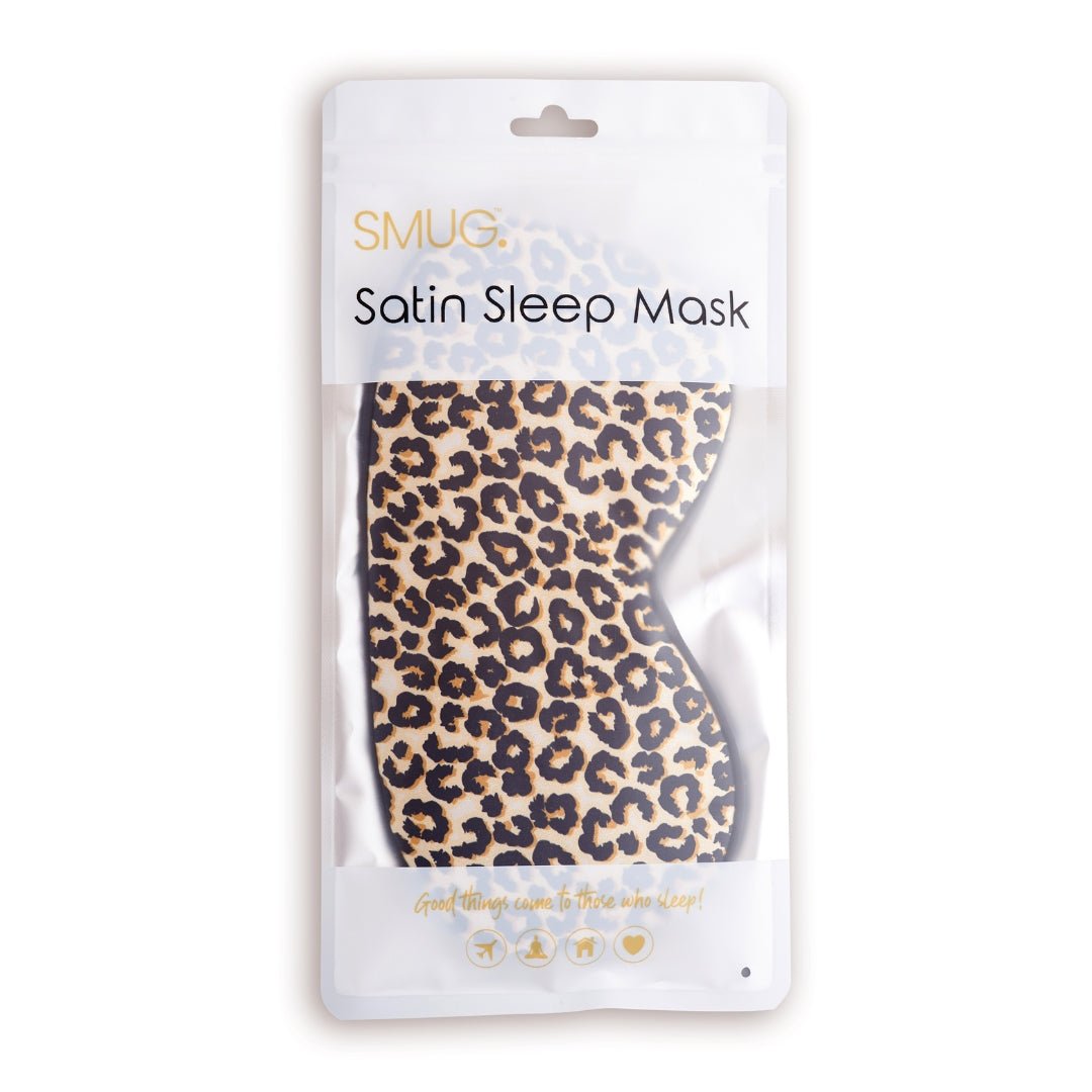 SMUG satin sleep mask with leopard print pattern, soft fabric designed for comfortable sleep and eye coverage.