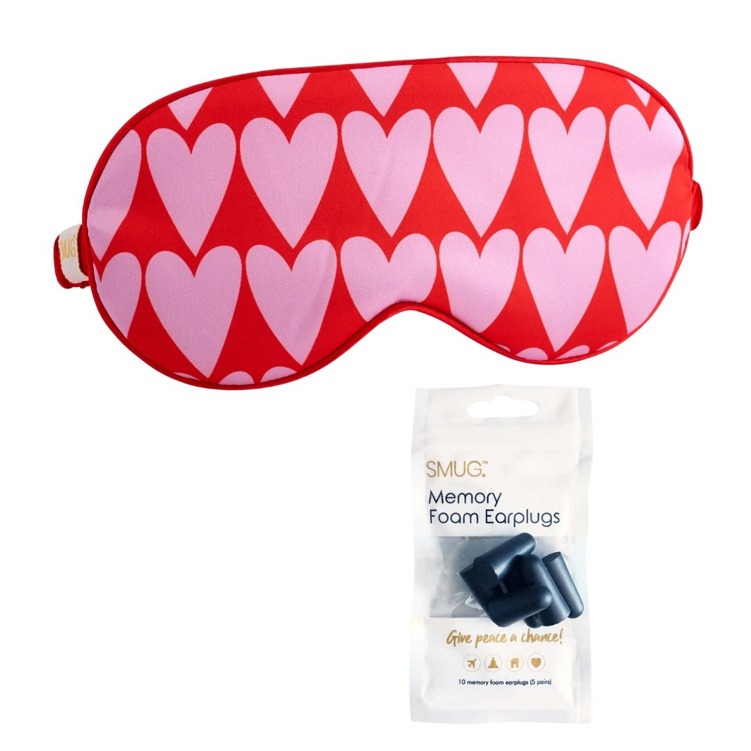 Black satin sleep mask with longheart print by SMUG, featuring earplugs for comfortable, restful sleep.