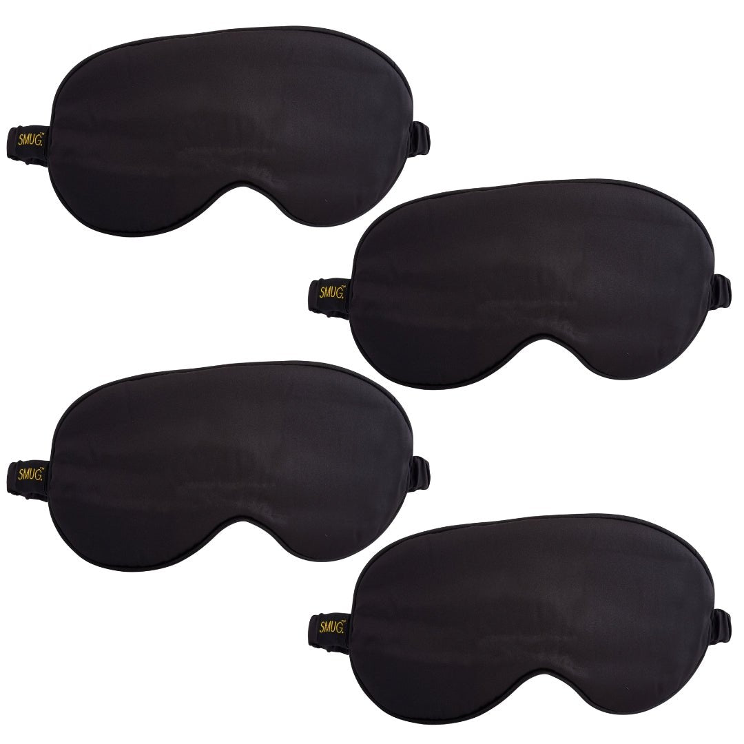 Set of SMUG satin sleep masks in various designs, including a black satin sleep mask, perfect for comfortable, stylish sleep.