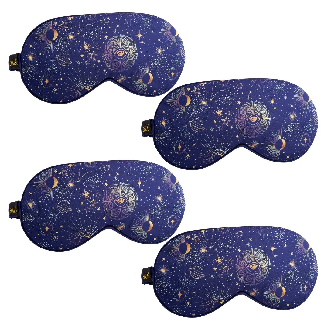 Set of SMUG satin sleep masks in various designs, including a blue celestial pattern, perfect for restful sleep and relaxation.
