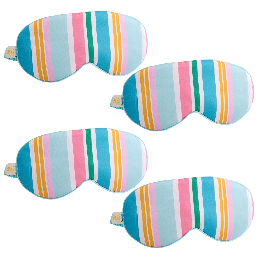 Set of SMUG satin sleep masks in bold spring stripe designs, soft and comfortable for restful sleep.