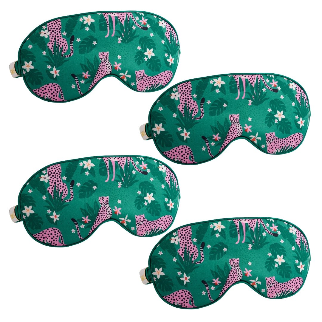SMUG satin sleep mask set featuring various designs, including a cheetah print, designed for comfortable sleep and relaxation.