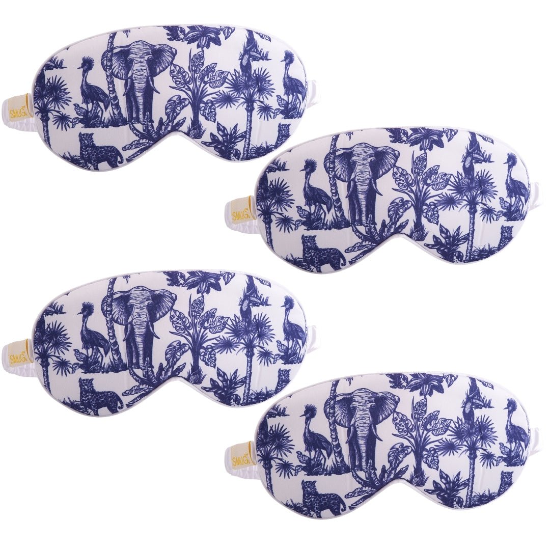 SMUG satin sleep mask set featuring multiple designs, including an elephant pattern, for comfortable and stylish sleep accessories.