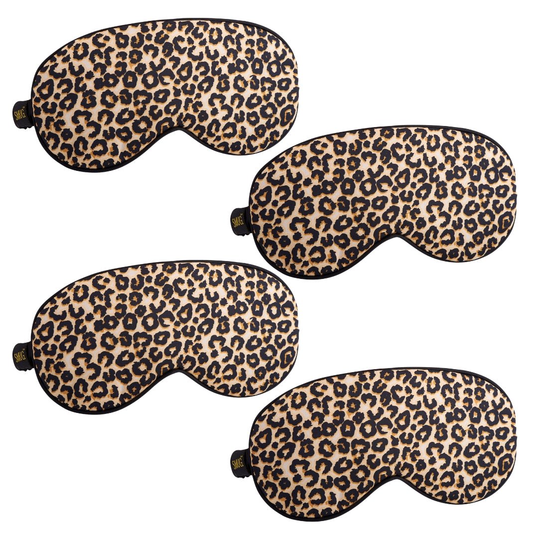 SMUG satin sleep mask set with various designs, including a leopard print sleep mask for comfortable, stylish nighttime rest.