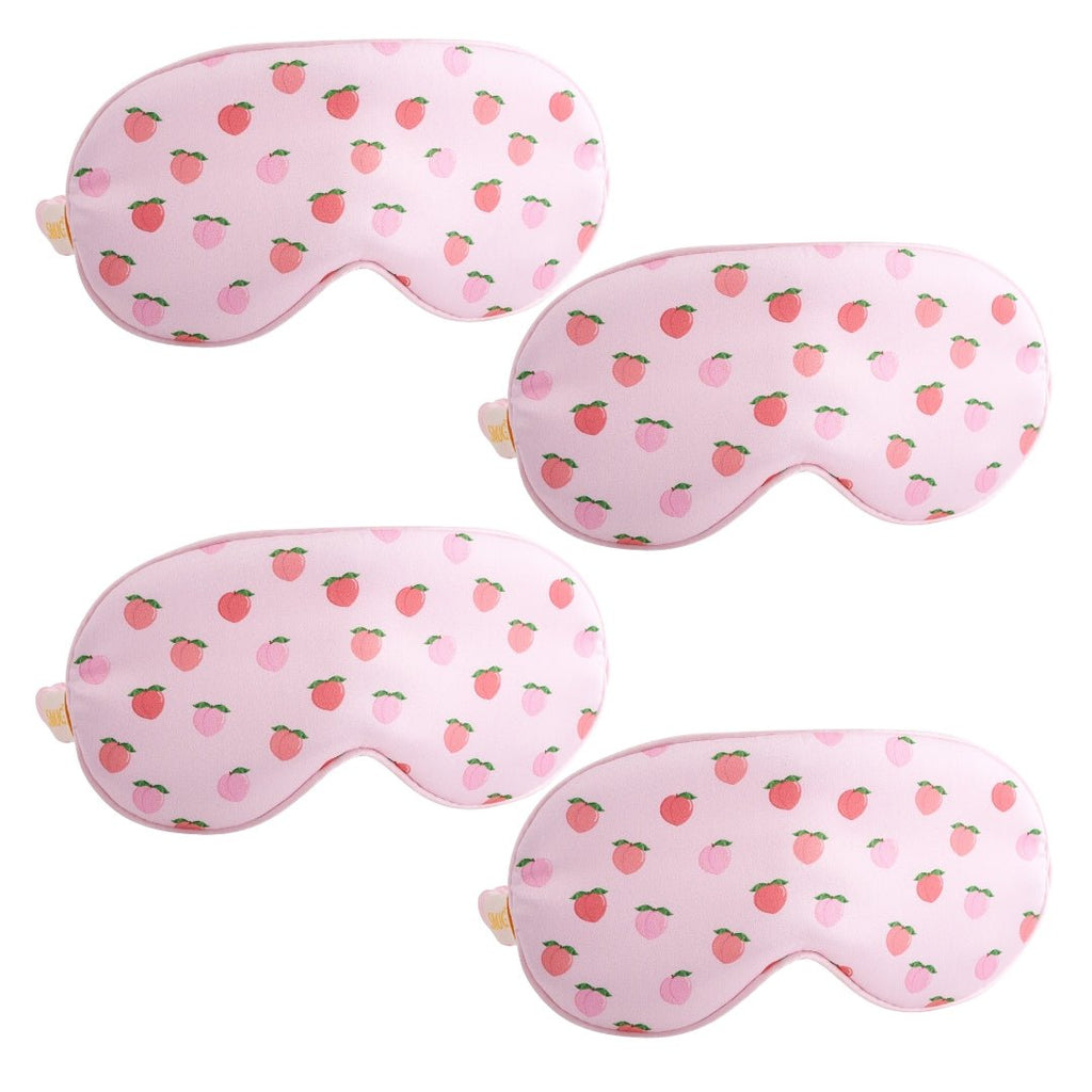Set of SMUG satin sleep masks in various peachy and stylish designs, perfect for comfortable, restful sleep.