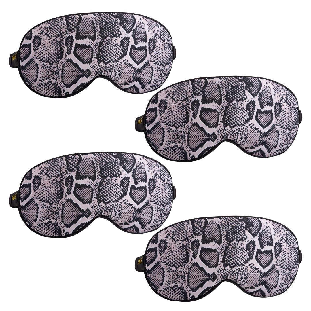 Set of SMUG satin sleep masks with various designs, including a stylish snake pattern, for comfortable and stylish sleep.