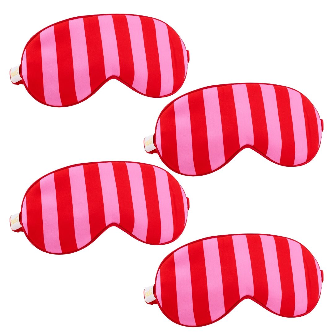 Set of SMUG satin sleep masks in various colorful candy-inspired designs, perfect for comfortable, stylish sleep.