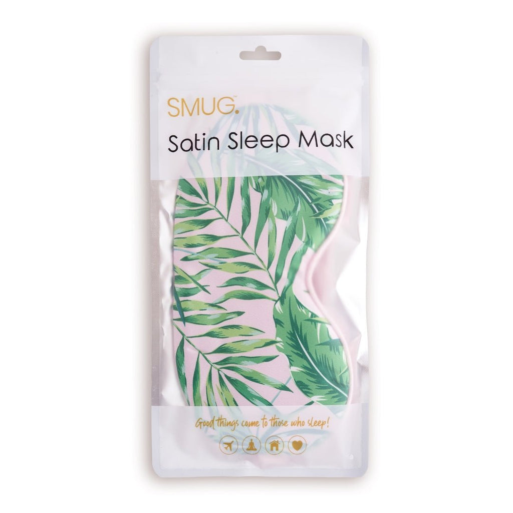 SMUG satin sleep mask with palm print, shown in packaging, comfortable and soft for restful sleep and relaxation.