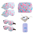 SMUG Sleepover Set with cherry blossom print, featuring pajamas and accessories for a cozy night in.