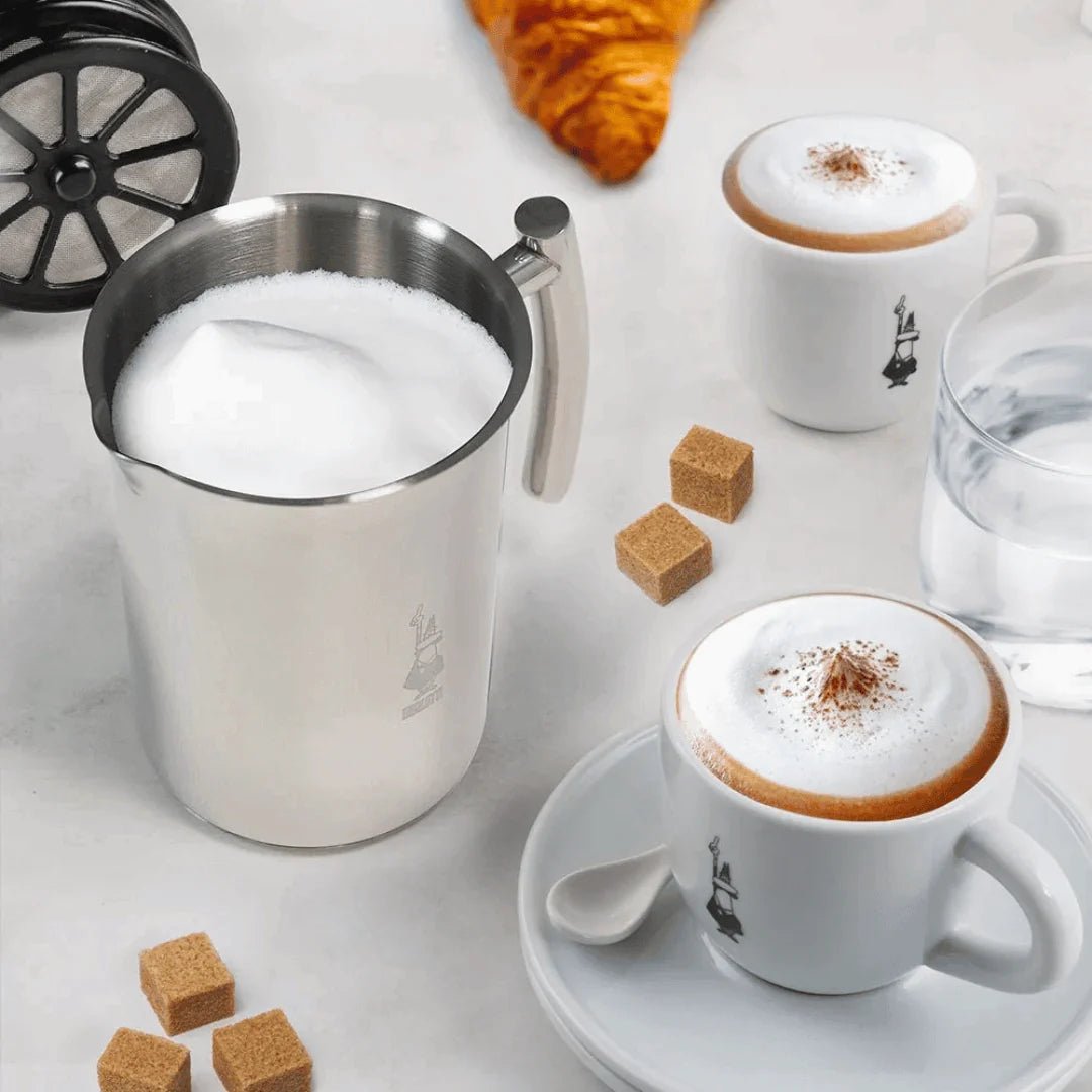 Bialetti Brew Italia stainless steel manual milk frother for creamy steamed milk and froth for coffee drinks.