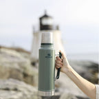 Stanley Legendary Classic 1.0L water bottle in ash color, durable stainless steel design with a secure lid.