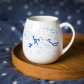 Trouvaille starry constellation color-in mug with ceramic pen, featuring a night sky design for customizable stargazing artwork.
