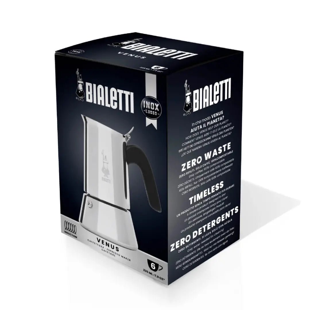 Bialetti Venus stovetop coffee maker with polished aluminum exterior and black handle for brewing Italian espresso.