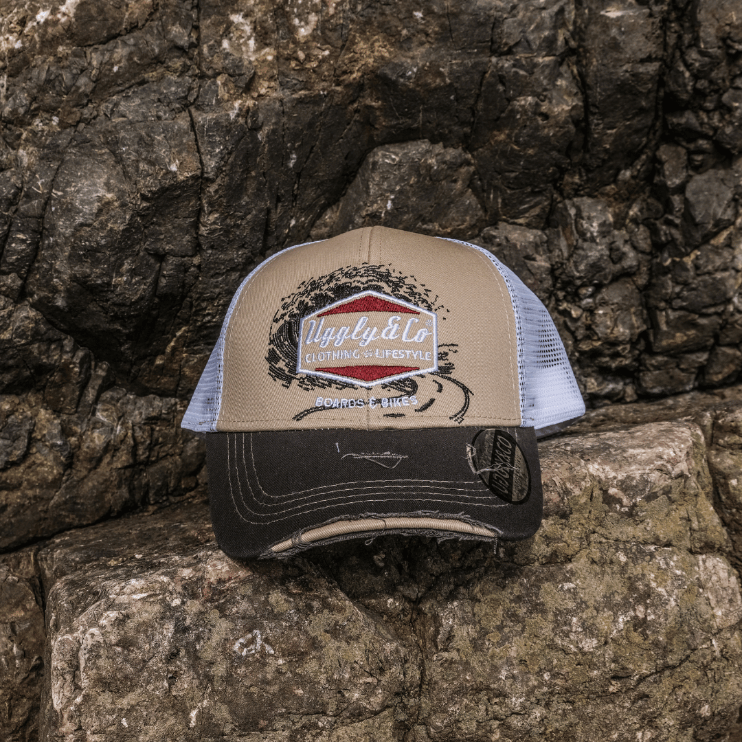 Beige Surf Diamond Trucker Cap by Uggly and Co featuring a stylish diamond design and adjustable mesh back.