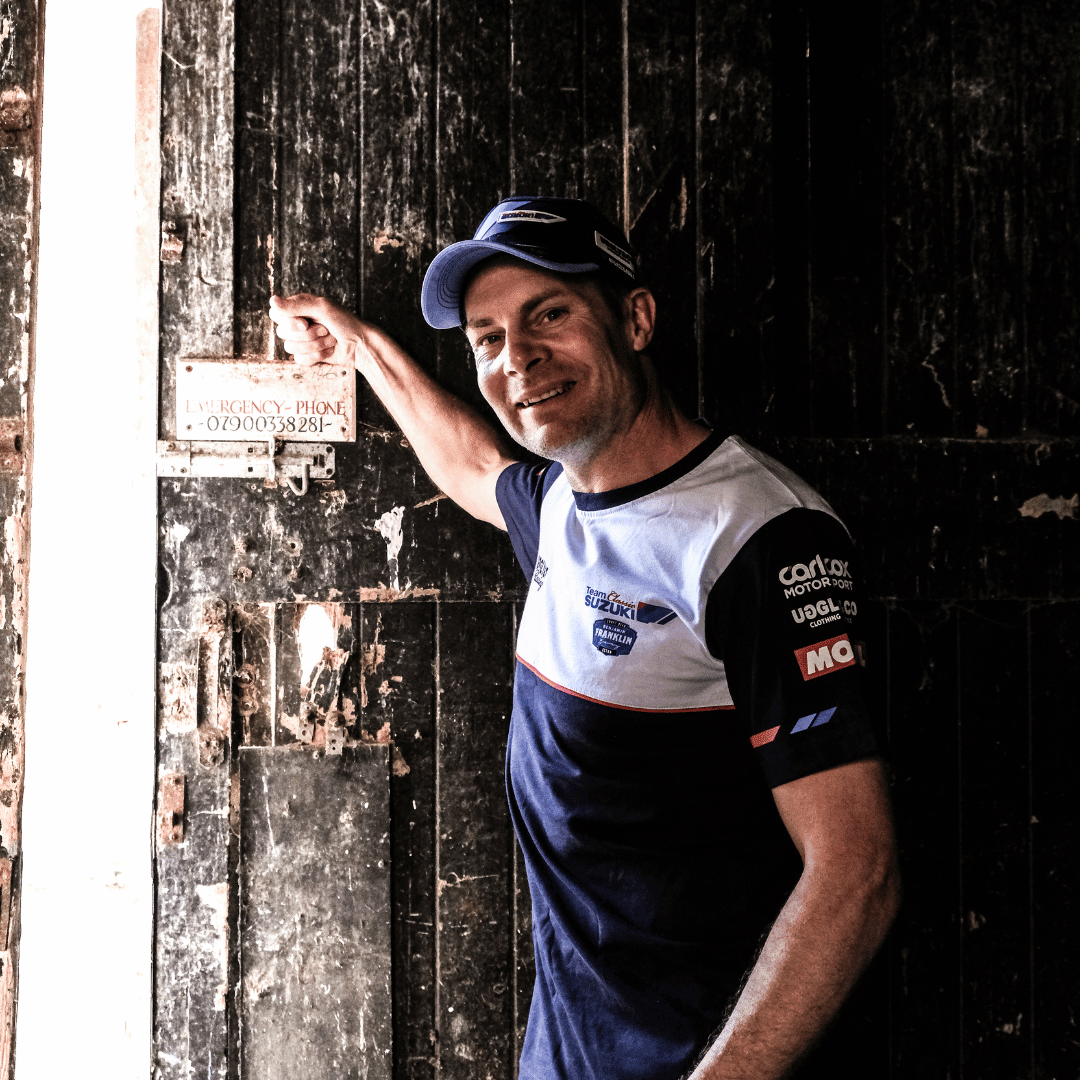 Uggly and Co Team Classic Suzuki Trucker Cap featuring a racing motorcycle logo and adjustable mesh back.